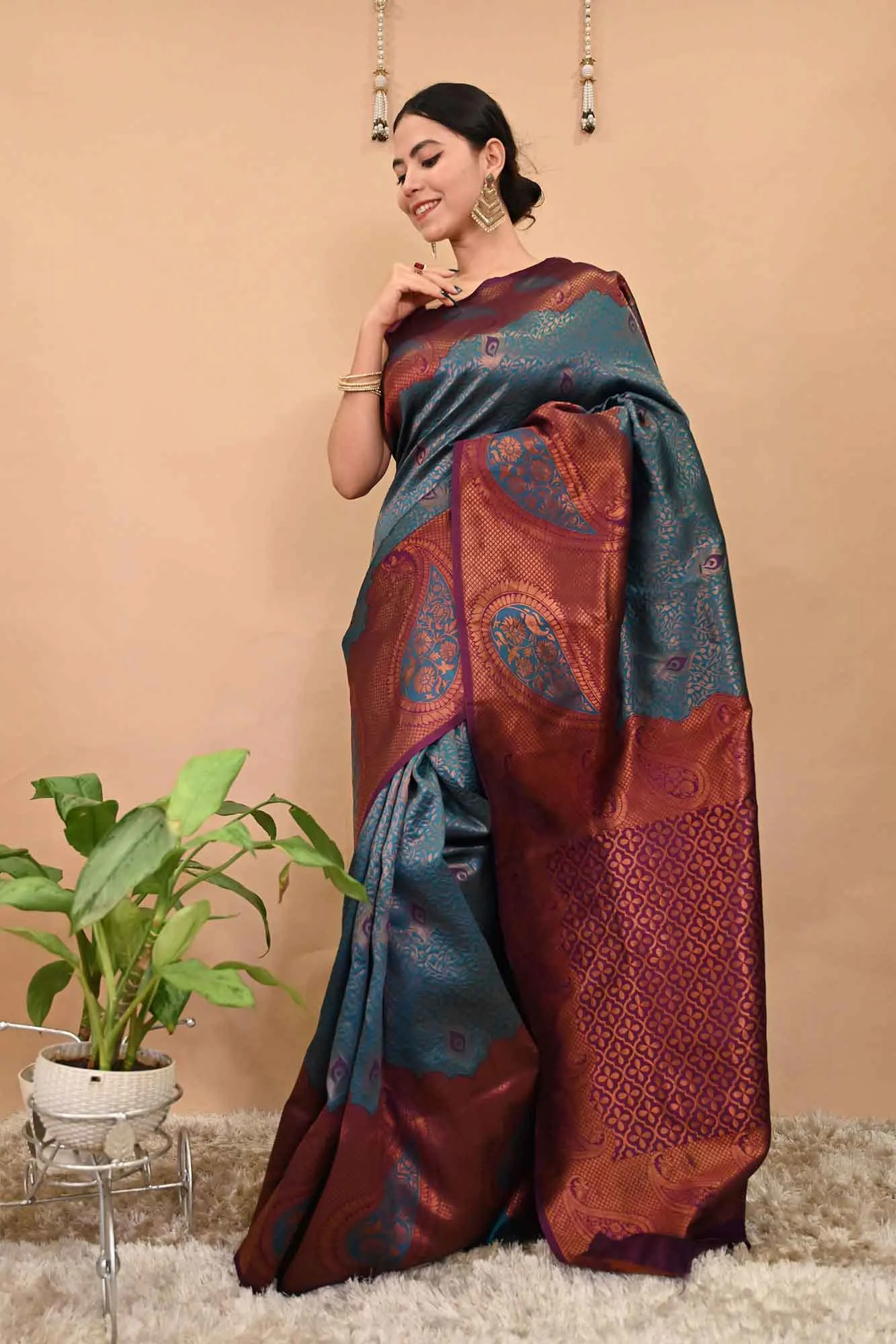 Kanchipuram Pattu meets Banarasi Brocade Teal Blue With Copper Zari Bordered Paisley Woven With Ornate Pallu Pre Drape Saree